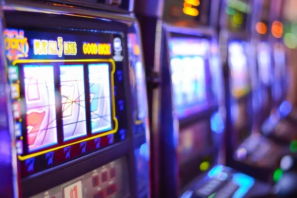 Mega Wheel live-dealer interface on mobile phone screen showing spinning wheel and bet sectors